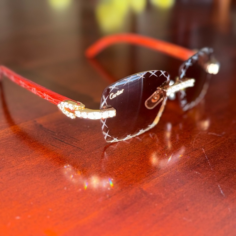 Cartier unisex Sunglasses in Red and Gold